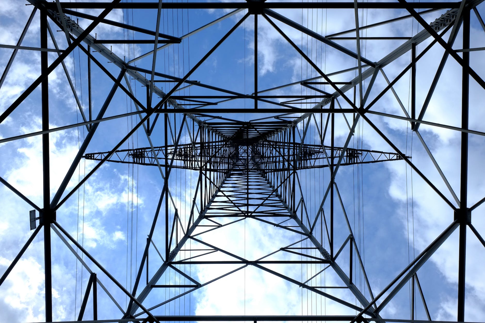 An electricity pylon viewed from below.